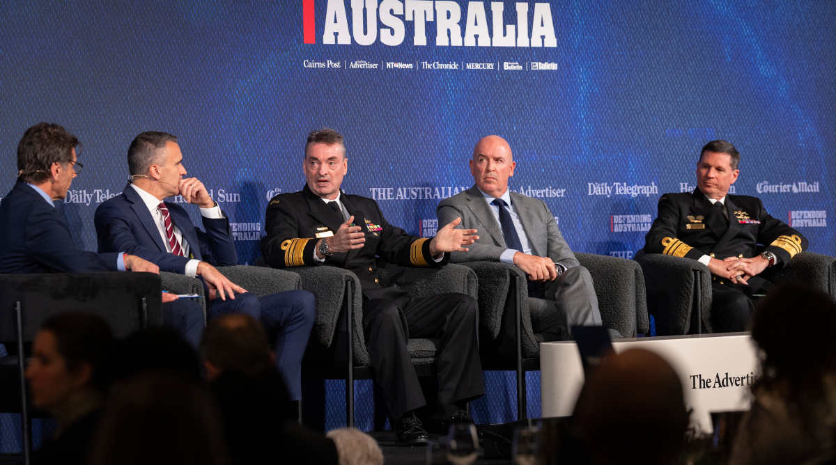 Australian Submarine Agency Director-General, Vice Admiral Jonathan Mead (middle), speaking on the Defending Australian panel at Parliament House in Canberra.