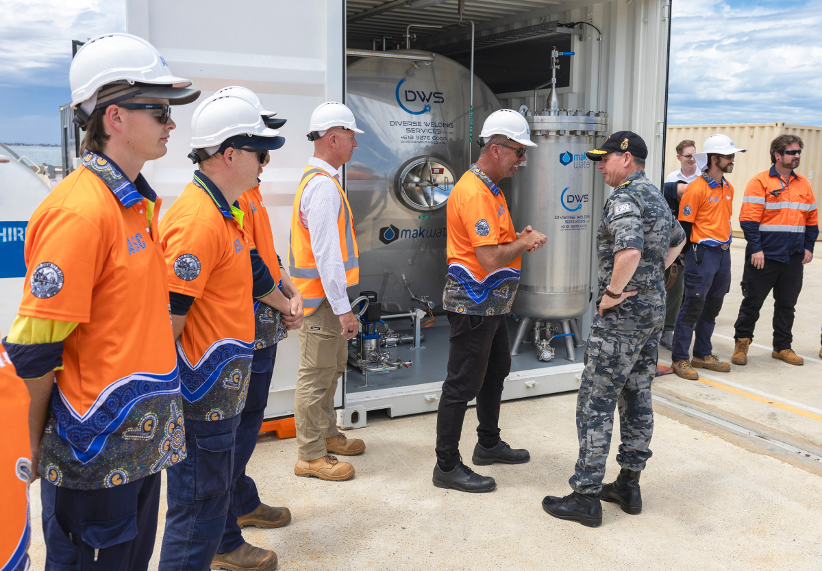 Chief of Navy Vice Admiral Mark Hammond AO, RAN, speaks with ASC workers about the locally manufactured pure water plant built in Australia to meet United States Navy standards and specifications for use aboard a USN submarine during the Submarine Maintenance Period at HMAS Stirling, Western Australia.