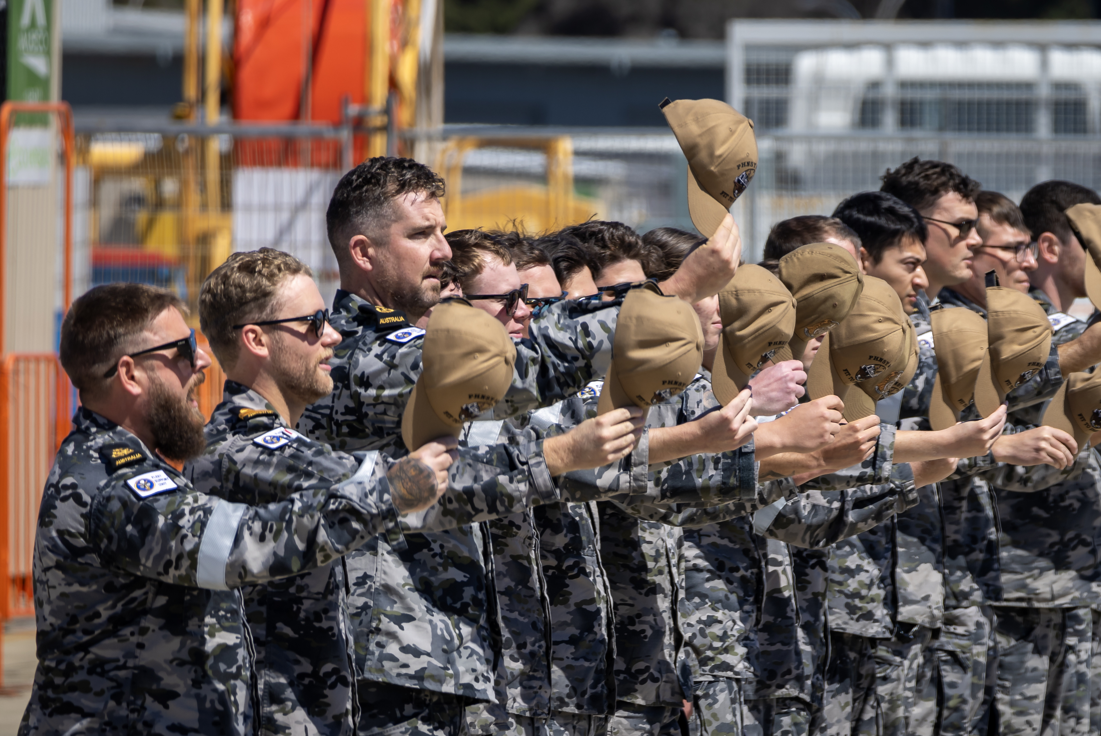 Personnel from Fleet Support Unit-West cheer ship as Virginia class fast-attack submarine USS Vermont departs HMAS Stirling after completing a Submarine Maintenance Period in Western Australia.