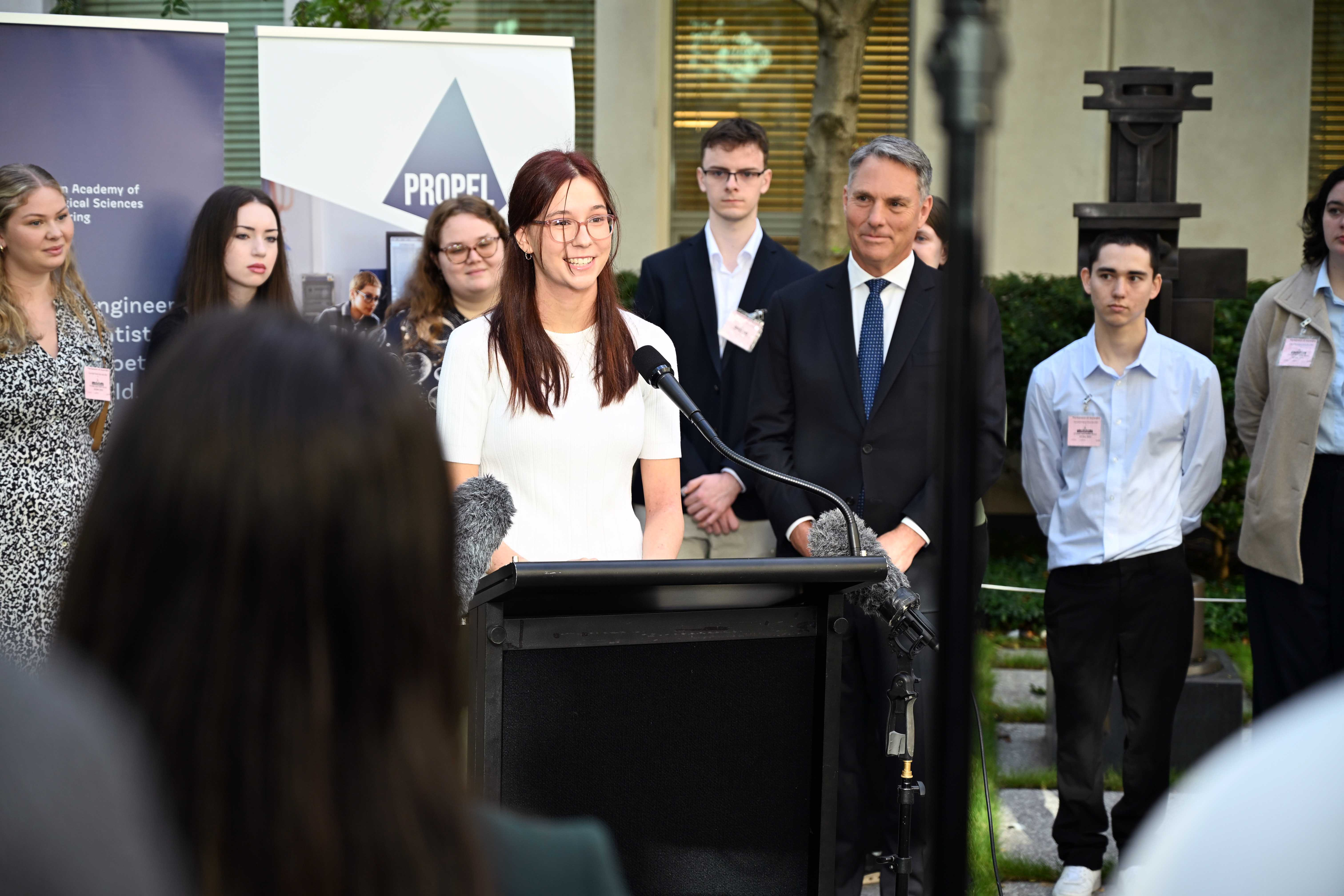 Propel scholar, Katelyn, speaks to the media during the launch of the Propel scholarship launch at Parliament House.