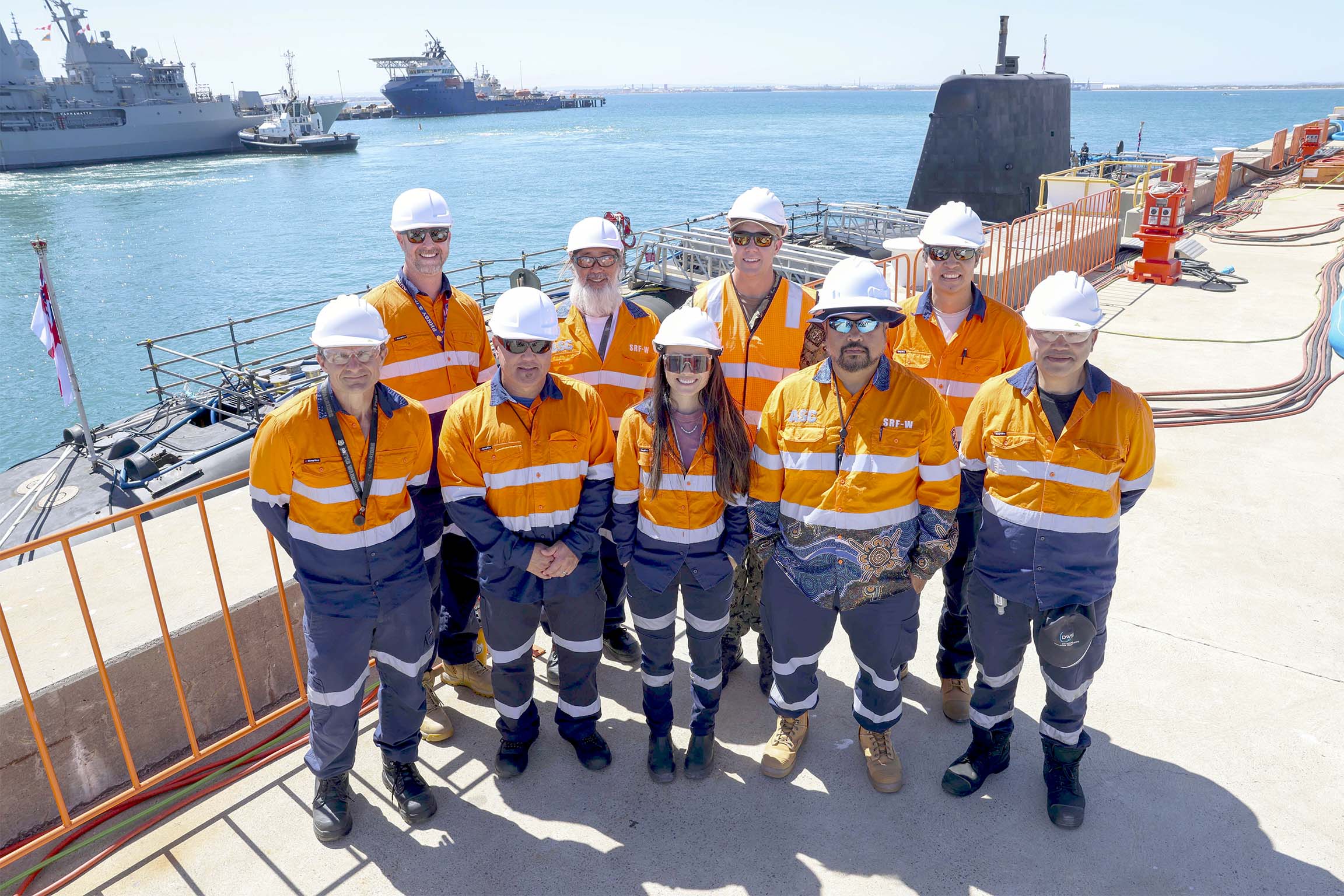 The HPAC team in front of HMS Anson during the submarine's maintenance period at HMAS Stirling. Image: PO Phot Unaisi Luke; &copy; UK MOD Crown Copyright 2026