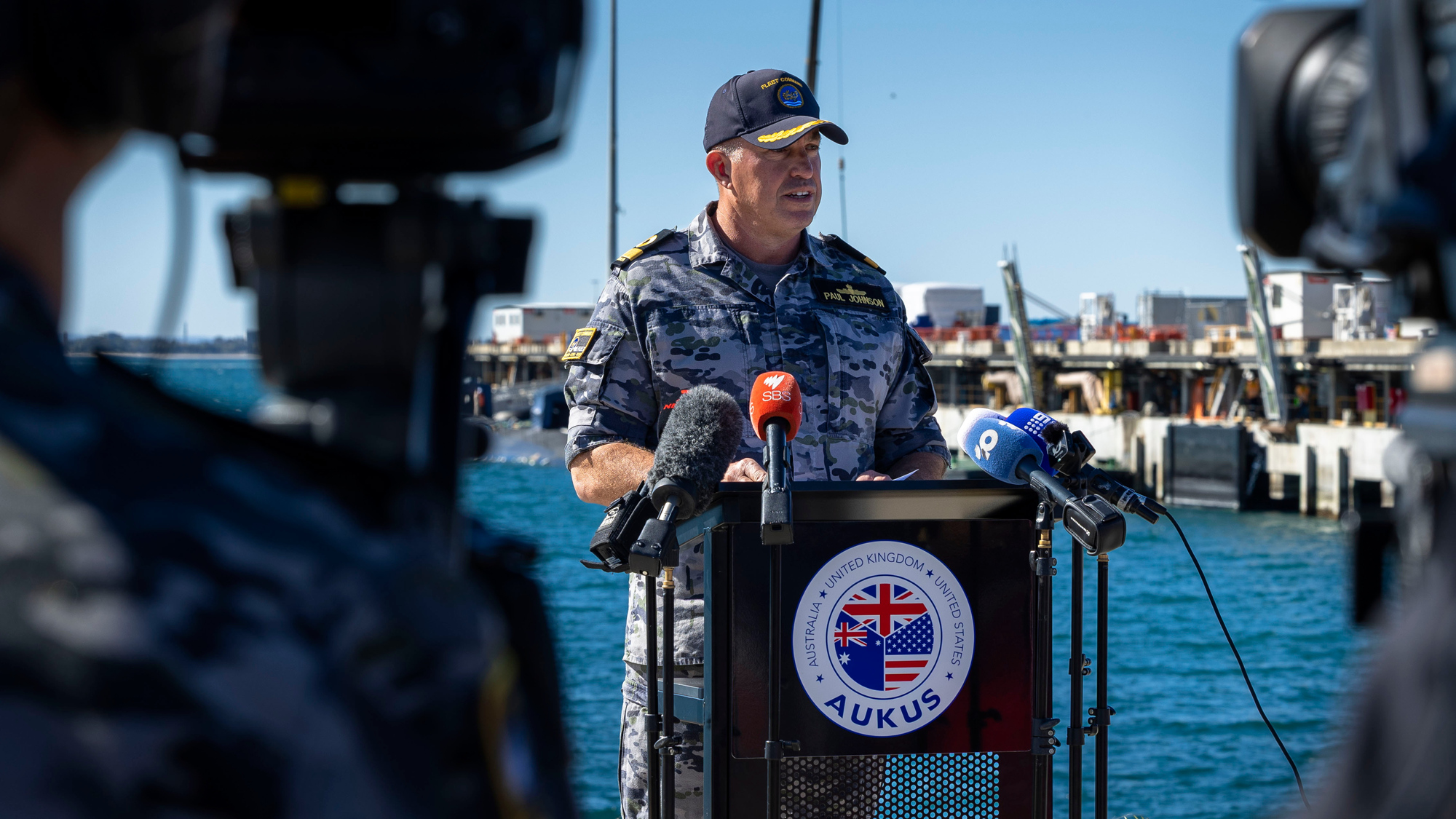 Commander Fleet Base West, Commodore Paul Johnson, CSC, RAN, addresses media during a press conference at HMAS Stirling, Western Australia.
