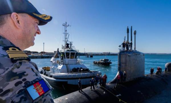Director-General Australian Submarine Agency Vice Admiral Jonathan Mead AO, RAN watches United States Navy Virginia-class submarine USS North Carolina (SSN 777) as the submarine arrives at Fleet Base West in Rockingham, Western Australia.