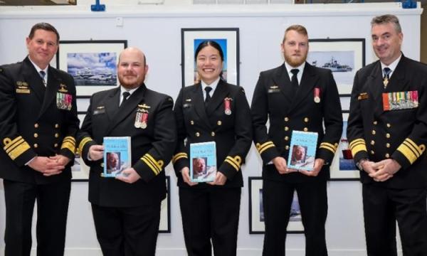 hief of Navy, Vice Admiral Mark Hammond, AO, RAN (far left) and the Director-General of the Australian Submarine Agency Vice Admiral Jonathan Mead, AO, RAN (far right), with Australia's first Navy officers to graduate from the Royal Navy's Nuclear Reactor Course.
