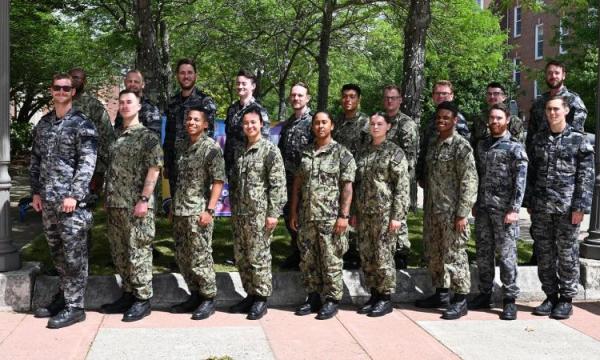 Royal Australian Navy Enlisted Sailors pose for a photograph with their US peers at US Submarine School.