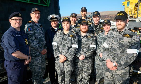 Lieutenant Commander James, Lieutenant Stephen and Lieutenant Isabella celebrate completing 2 years of training on the Royal Navy’s Astute class submarines.