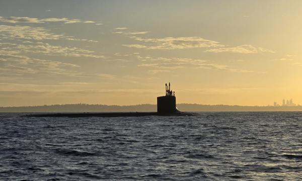 USS Minnesota (SSN 783) en route to its port visit to HMAS Stirling, is surfaced off the western Australian coast.