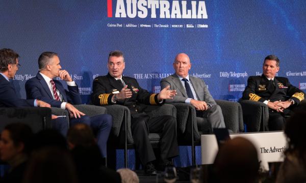Australian Submarine Agency Director-General, Vice Admiral Jonathan Mead (middle), speaking on the Defending Australian panel at Parliament House in Canberra.